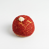 Red textured Berry Choux ball with a white topping at Morristown Nj
