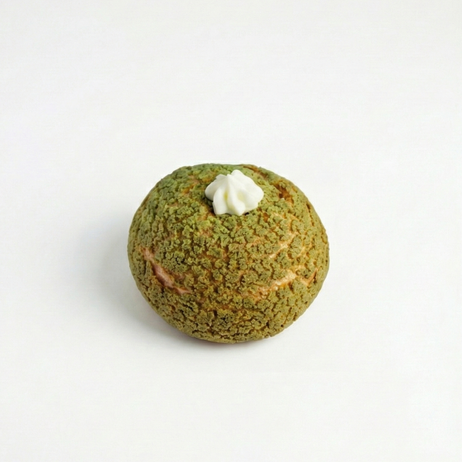 Green Pistachio Choux with a white cap at Morristown Nj
