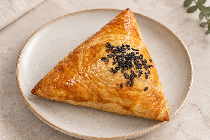 dän beef samsa, a golden baked pastry