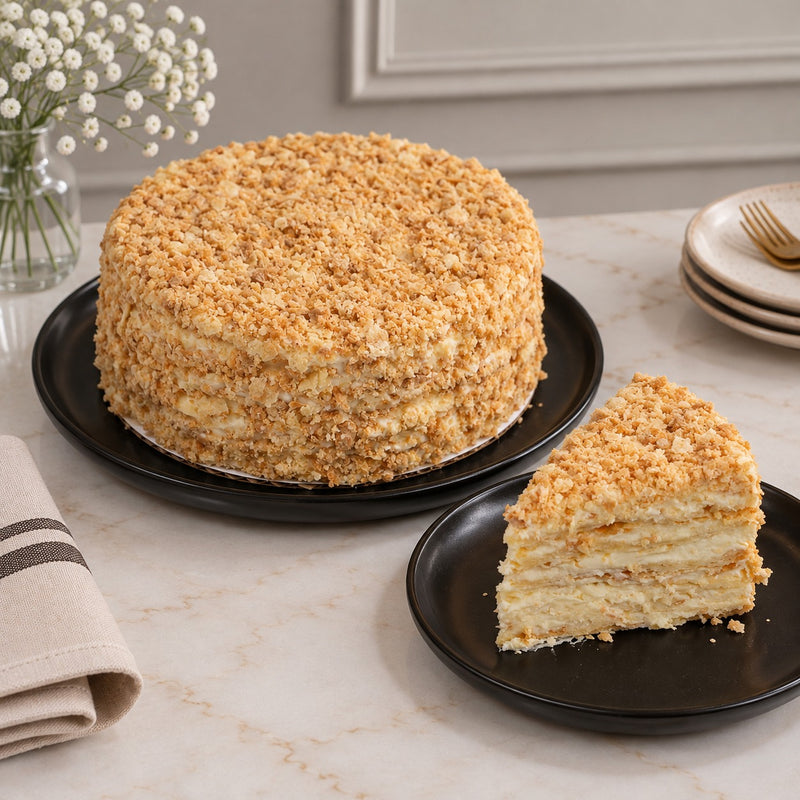 dän Napoleon cake — whole 8-inch, crisp butter-pastry layers with light cream and pastry crumb